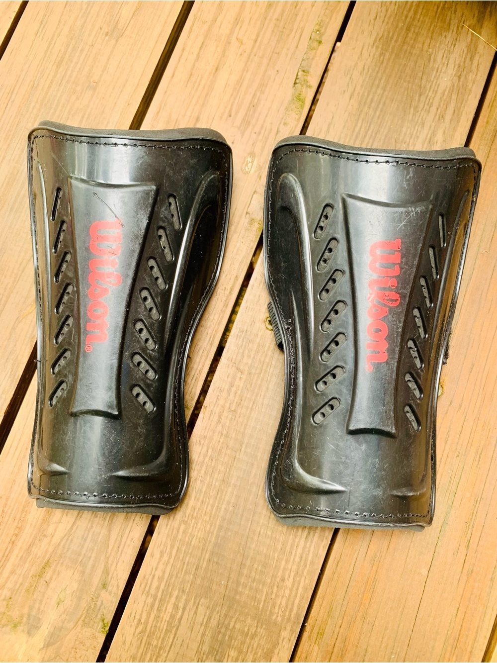 Wilson Black Shin Guards with Red Logo